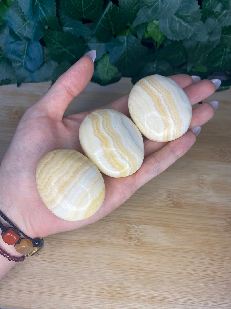 Orange Calcite Palm Stones