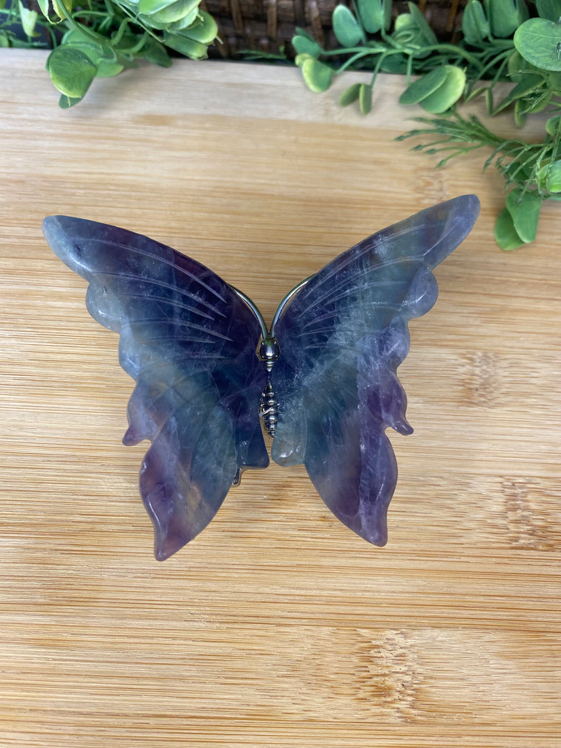 Ailes de papillon en fluorite sur support